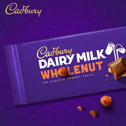 Cadbury Dairy Milk Chocolate Whole Nut 180g  แคดเบอรี แดรีมิลค์ ช็อกโกแลตนมผสมถั่วเฮเซลนัท 180g